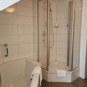 Kamer met een Queen Size Bed